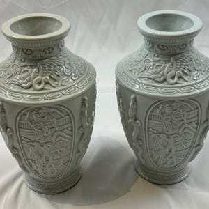 2 Decorative Detailed Asian White Ceramic Vases Sold Individually