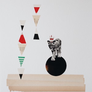 May include: A mixed-media artwork featuring a grayscale lion cub wearing a crown, balanced on a black circle. Geometric shapes in red, black, and white are arranged vertically, with a layered paper base. Signed "Abeau '75".