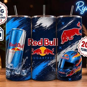 May include: Three 20oz Red Bull tumblers with a blue and white design. One tumbler features a Red Bull can with ice cubes, another has the Red Bull logo, and the third displays a racing helmet. Each tumbler has a straw.