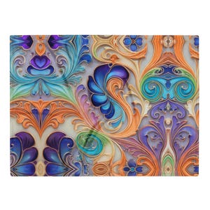 May include: A rectangular throw blanket featuring a repeating pattern of intricate, raised-effect swirls and floral-inspired motifs in vibrant shades of orange, deep blue, purple, teal, and light green against a soft, neutral-toned background.