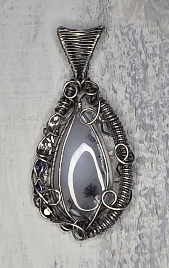 Merlinite Pendant: Hand Woven Sterling Silver, White Topaz Iolite & Onyx