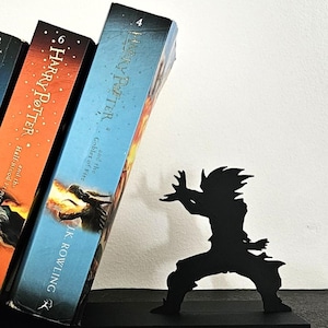 Fermalibri/manga inclinato ispirato a Goku kamehameha Dragon ball Z