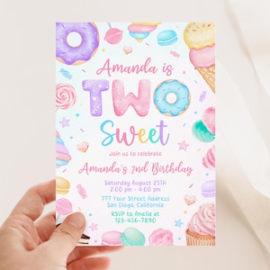 May include: A birthday invitation card featuring watercolor illustrations of donuts, ice cream, and candy. The text reads: Amanda is TWO Sweet, Join us to celebrate, Amanda's 2nd Birthday, Saturday August 25TH, 2:00 pm - 4:00 pm, 777 Your Street Address, San Diego, California, RSVP to Amelia at 123-456-7890.