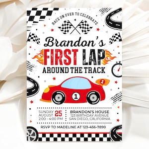 May include: A birthday invitation with a race car theme. The invitation features a red race car, checkered flags, and the text "Brandon's FIRST LAP AROUND THE TRACK". The date and time are also included.