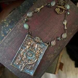 Swan Song Handmade Artisan Necklace - Hidden Portrait - Leda and the Swan - Greek Mythology - Myth - Bronze Patina - Helen of Troy - Zeus