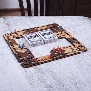 Pegs and Jokers to 4  players board game handmade gifts, popular in the US
