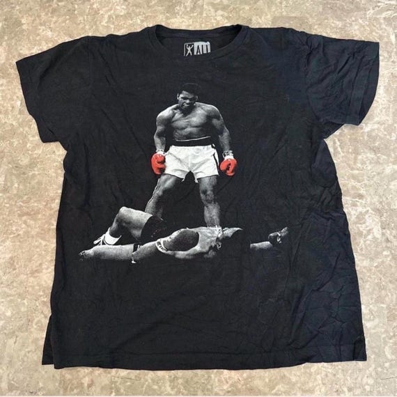 Vintage Muhammad Ali “Down Goes Frazier” T-shirt. - image 1