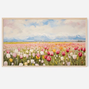 May include: A framed painting depicting a field of pink, white and yellow tulips with a mountain range in the background.
