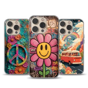 May include: Three phone cases with vibrant designs. One has a peace symbol and flowers, another a large pink flower with a smiley face, and the third a rainbow and a red van. Each case has a clear protective border.