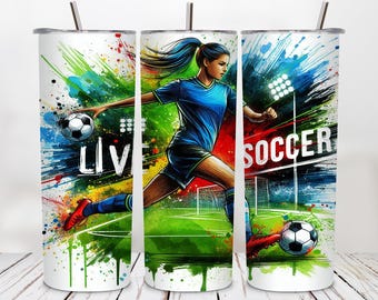 May include: A white tumbler with a colourful abstract design featuring a female football player kicking a ball. The text "LIVE" and "SOCCER" are visible on the tumbler.