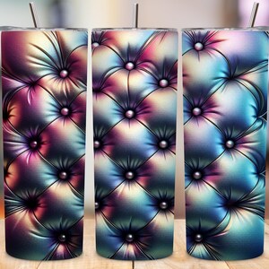 May include: Three stainless steel tumblers with a colorful, iridescent, tufted upholstery design. The design features a repeating pattern of squares with rounded corners and buttons in the center of each square.