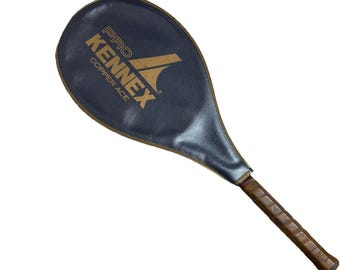Raqueta de tenis vintage Pro Kennex Copper Ace con funda de cuero y mango de grafito