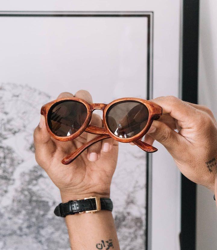 Glasses, all models with walnut wood, along with a case and sunglasses
