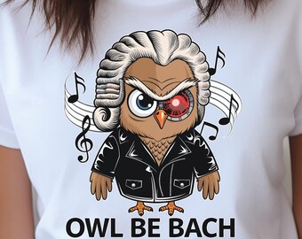 May include: White t-shirt with a cartoon owl wearing a judge's wig and a leather jacket. The owl has one red eye and is surrounded by musical notes. The text "OWL BE BACH" is printed below the owl.