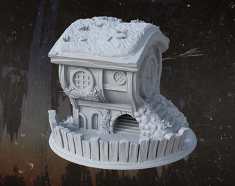 May include: A white, 3D printed miniature of a small, round house with a thatched roof, a fence, and a small entrance. The house has a round window and a small door.