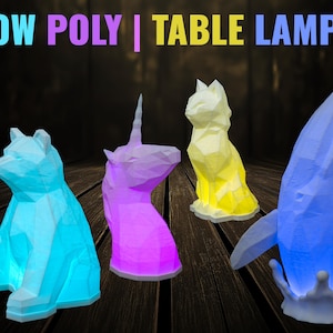 May include: Four low poly table lamps in the shapes of a bear, unicorn, cat, and whale. The bear is light blue, the unicorn is purple, the cat is yellow, and the whale is blue.