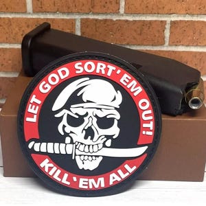 May include: A black and red embroidered patch with a skull and crossbones design. The text on the patch reads "Let God Sort 'Em Out! Kill 'Em All".
