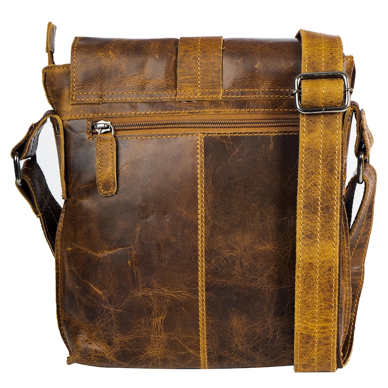 May include: A brown leather messenger bag with a long adjustable strap. The bag has a flap closure with a buckle and a zippered pocket on the front.