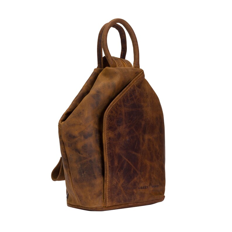 May include: A brown leather backpack with a single strap and a top handle. The bag has a distressed look and the brand name "GREEN TOWN" is visible on the bottom.