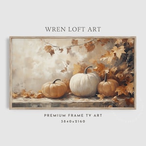Könnte beinhalten: Ein Gemälde mit drei Kürbissen auf einer Holzoberfläche mit Herbstblättern. Die Kürbisse sind weiß, orange und braun. Die Blätter sind braun und gelb. Das Gemälde ist im rustikalen Stil gehalten.