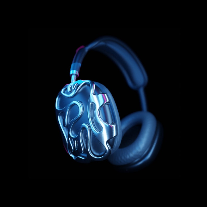 May include: A pair of silver headphones with a blue and pink light reflecting off the surface. The headphones have a unique, textured design on the earcups.
