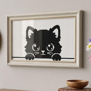 May include: Framed cross-stitch art featuring a black cat silhouette with large eyes and paws. The artwork is set against a white background and framed in a light wood frame with a gold inner edge. A charming piece for cat lovers.