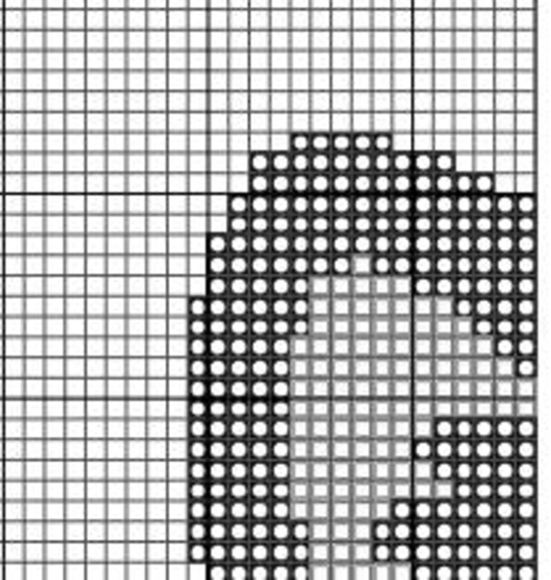 May include: A pixelated image of the letter "A" in black and gray, set against a grid background. The letter is formed by a series of small, dark squares, creating a blocky, digital aesthetic. The grid provides a structured backdrop.