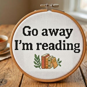 May include: A trio of ceramic mugs with a speckled, matte finish in cream, light grey, and dark grey. Each mug features a simple, minimalist design, ideal for tea or coffee.