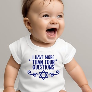 May include: A white baby onesie with a blue Star of David and the text "I have more than four questions".