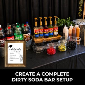 Graduation dirty soda bar setup with framed sign and menu displayed alongside soda bottles, flavored syrups, toppings, cups, and ice station. Text reads “Create a Complete Dirty Soda Bar Setup.”