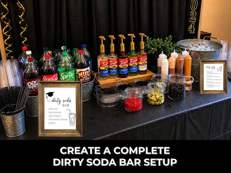 Graduation dirty soda bar setup with framed sign and menu displayed alongside soda bottles, flavored syrups, toppings, cups, and ice station. Text reads “Create a Complete Dirty Soda Bar Setup.”