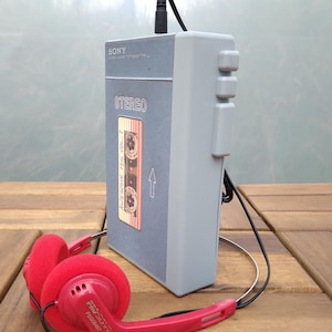 TPS-L2 prop with red headphones for Star Lord  Cosplay  - The front is a sticker/label