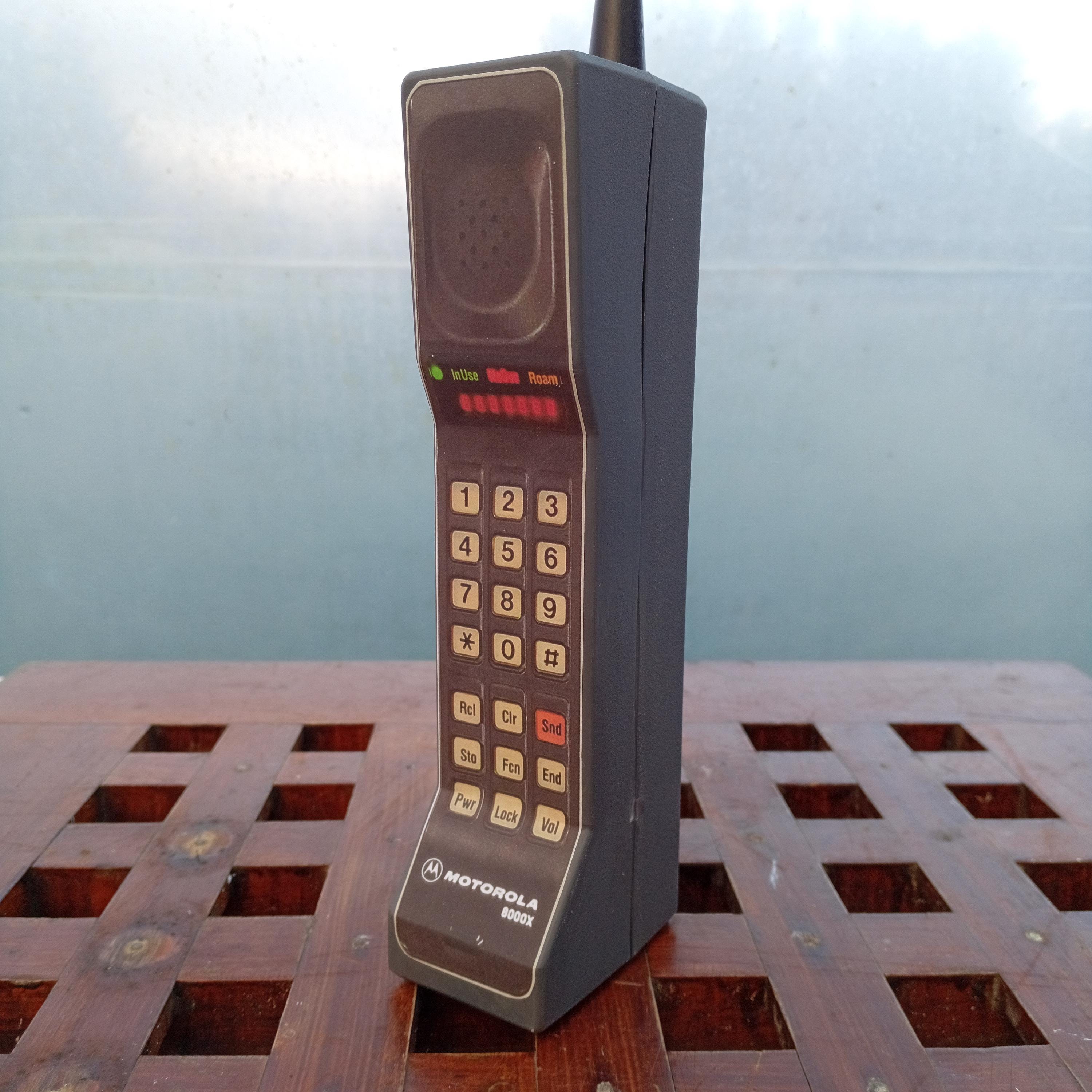 Dynatac 8000x Brick Phone Prop in Gray. the Front is a Label. No