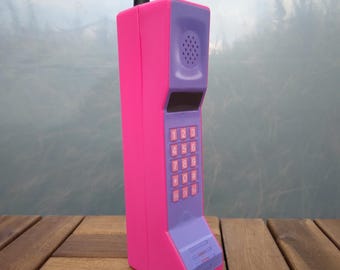 Handmade Pink Brick Phone Prop. The front is a label. No buttons