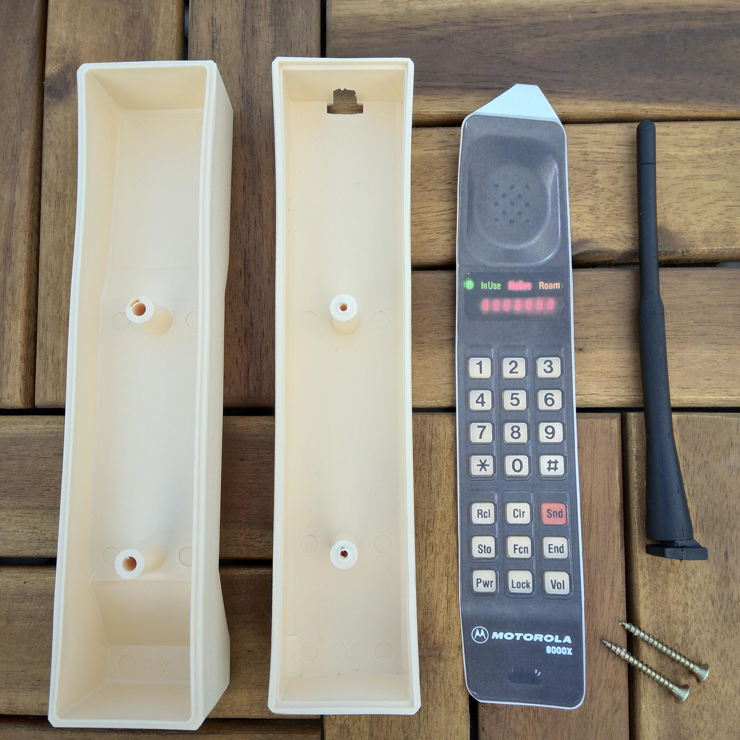 Dynatac 8000x Brick Phone Prop in Beige. the Front is a Label. No