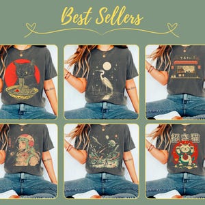 May include: A collection of six dark gray t-shirts featuring various Japanese-inspired graphics. Designs include a black cat eating ramen, a heron, a Japanese restaurant, an astronaut, a space scene, and a lucky cat. The text "Best Sellers" is at the top.