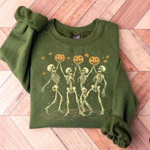 Skeleton Halloween sweatshirt, Dancing skeletons, Pumpkin Halloween, Spooky Fall Season sweater, Skeleton design, Unisex
