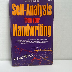May include: A vintage paperback book titled "Self-Analysis from your Handwriting" by Albert E. Hughes. The cover is purple with orange text. The book's description includes techniques for understanding character and personality.