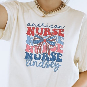 Custom name american nurse shirt, coquette nurse tee, personalized nurse tee, 4th of July nurse shirt, red white and blue nursing shirt