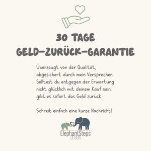 May include: Cream-colored graphic with text in German, including "30 TAGE GELD-ZUR&Uuml;CK-GARANTIE" and a guarantee statement. Features a hand holding a heart, and a logo with two elephants and the text "ElephantSteps DESIGN."