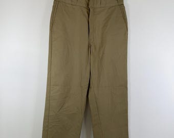 Spodnie Dickies z lat 90. (rozmiar: 32x34) wyprodukowane w Hondurasie