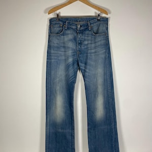 Jeans Levi's Vintage dos anos 90 (Tamanho: L36 L36) Fabricado na Polônia
