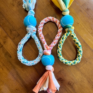 Braided fleece loop and ball dog tug toy large