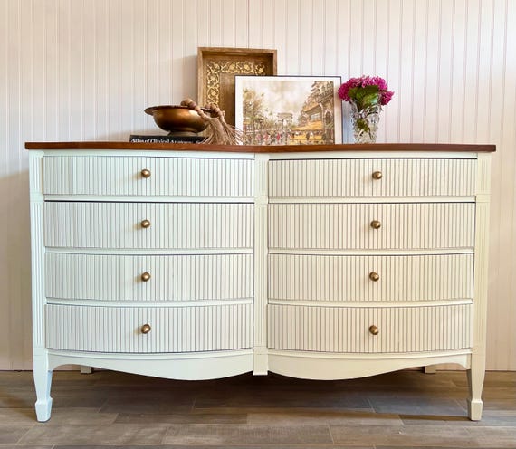 white dresser with gold bow knobs I caved and ordered some bow knobs! I'm so happy I did because... DO YOU  SEE THESE KNOBS???  . Here's why I ordered these: 1) The  @crateandbarrel bow knobs were $9