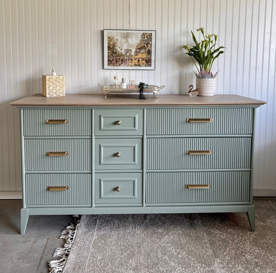 gray green dresser This dresser was painted in a soft sage green color (can you tell I love green?), called Silver Sage by @houseandcanvas. I love how soothing yet neutral this color is. Sold!