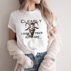 May include: White t-shirt with a black and white illustration of a goat with the text "CLEARLY I THOUGHT YOU'D ASK!" and "Brainy Bunch" underneath.