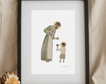 May include: Framed art print featuring an illustration of a man and a child, both with halos. The man wears a green and white robe, and the child holds a hammer. The print is in a black frame, with the text "SHILOH STUDIO" at the bottom.