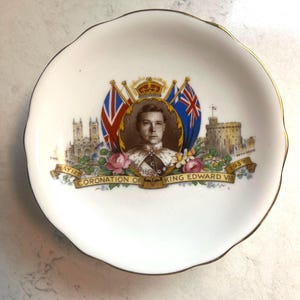 Commemorative dish for the coronation of King Edward VIII, dated May 12, 1937. However, Edward VIII abdicated in December 1936.