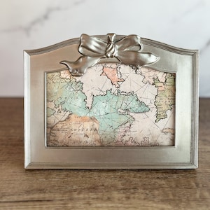 Silver-toned Frame with Bow