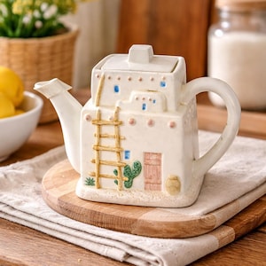 May include: A rustic wooden sign with the text "Welcome to our home" in white lettering. The sign features a distressed finish and a simple, inviting design, perfect for entryway decor.